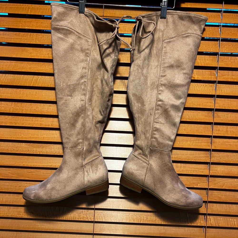 Over the knee boots , man made material, brand new.